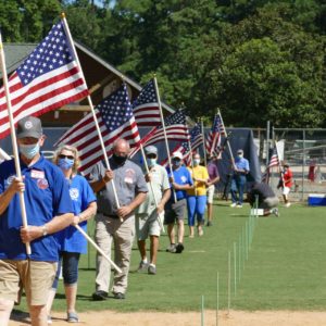 Archie Hobbs carries first US flag