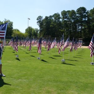 Debbie Pender with flag Friday