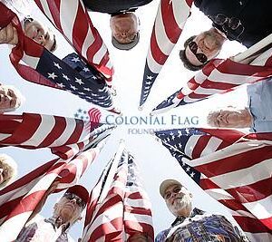 SVETERANS06Asf
(Metro, Murrieta, 9-03-09)
Clockwise from top, Bob Kast, Bob Bryant, Frank Donahoe, Dennis McCarbery, Bob Corsiglia, Patsy Orr, Dick Lawe, and Pete Palmer hold a few of the 2,000 flags that will be flown at Murrieta Town Square Park from November 8th through the 14th in honor of Veterans Day.  (The Press-Enterprise/Silvia Flores)