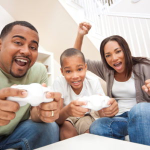 family-playing-video-game-console_thw3xb
