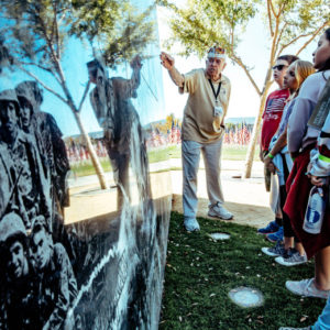 Charles Cram, a 94-year-old WWII vet and also a recipient of Silver Star, Purple Heart and Bronze Star Medals, points to the POW/MIA Memorial wall as he talks to 5th graders about the Battle of Iwo Jima during a field trip to Field of Honor at Town Square Park in Murrieta on Tuesday, Nov. 12, 2019. (Photo by Watchara Phomicinda, The Press-Enterprise/SCNG)