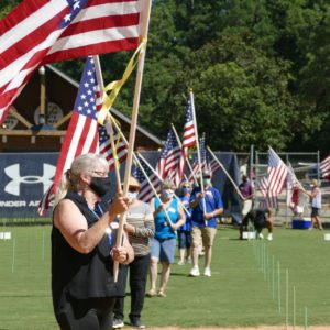 Maryellen carries flag