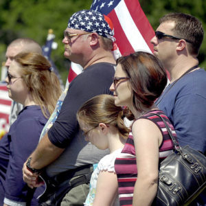 Spectators watch the Opening Dedication Ceremony on the Field of Honor held on the grounds of the Airborne and Special Operations Museum in Fayetteville on Saturday.