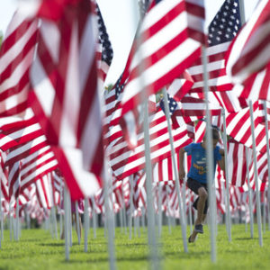 Steve Griffin  |  The Salt Lake Tribune


Children play in a field of over 3,000 seven-foot- tall U.S. flags as they sway in the breeze outside Sandy City Hall in Sandy, Utah, Wednesday, September 10, 2014.  Homes for Heroes and the Colonial Flag Foundation have sponsored UtahÕs 13th Annual Healing Field flag display to honor and remember the victims of the 9/11 terrorist attacks. Each flag representing a life lost in horrific attacks.