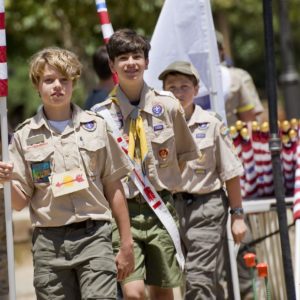 Jack McHenry, left, and Nathan Burger, center, and John Gaita, right, carry flags to be placed in the Field of Honor in Los Rios Park in San Juan Capistrano.

 ///ADDITIONAL INFO: 0526.sjc.honor - 5/21/16 - Photo by PAUL RODRIGUEZ - Honor scouts from the Order of the Arrow help place 300 large flags for a Field of Honor at Los Rios Park in San Juan Capistrano. The event is organized by Homefront America which will conduct a Memorial Day ceremony at the park.