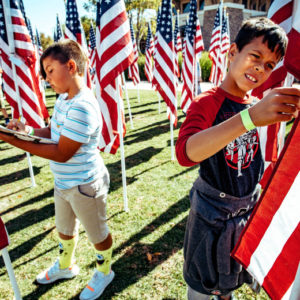 Fifth-grade students from Lisa J. Mails Elementary School, Ian Shoemaker, left, and Kain Lopez, both 10, write down information during a field trip to the Field of Honor at Town Square Park in Murrieta on Tuesday, Nov. 12, 2019. (Photo by Watchara Phomicinda, The Press-Enterprise/SCNG)