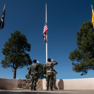The color guard salutes the flags after they are raised Monday (May 28) during the 2018 Memorial Day Ceremony at the Vietnam Veterans Memorial in Angel Fire.