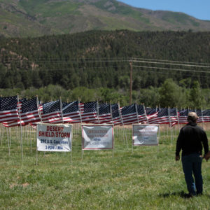 A couple admires Taos CountyÕs 13th Annual Field of Honor flag display on Monday (May 28) in Questa.